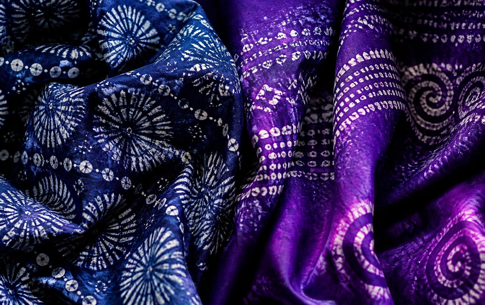 Luxurious draped purple and indigo Adire fabric